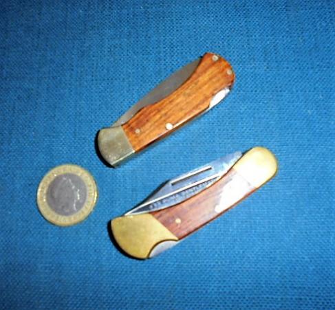 TWO MINIATURE PUMA FOLDING KNIVES S/N 0236